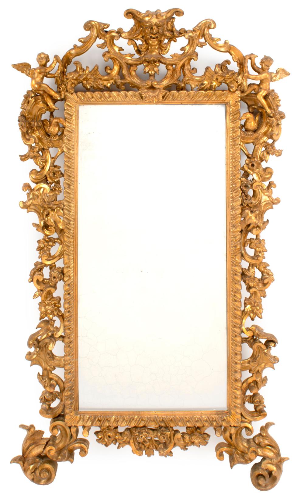 Appraisal: Antique Louis XV-Style Carved Giltwood Mirror extensively modeled foliate surround