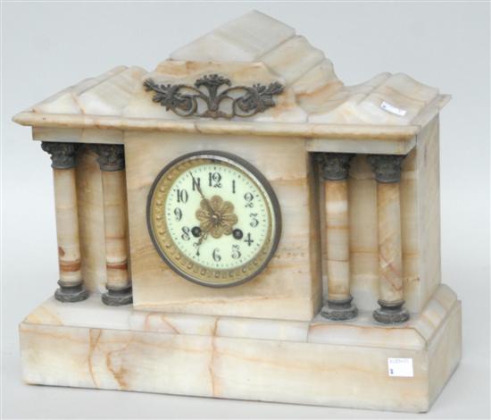 Appraisal: MANTLE CLOCK Carved stone with four columns and bronze mounts