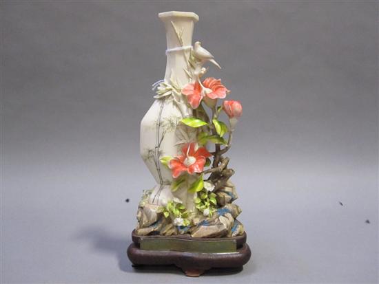 Appraisal: CHINESE BIRD AND FLORAL DECORATED SYNTHETIC VASE On a wood