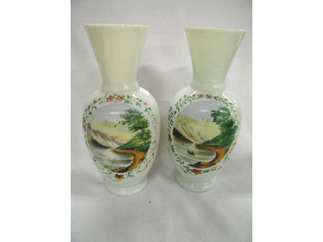 Appraisal: Pair of Victorian Art Glass Vases handpainted landscapes on fireglow