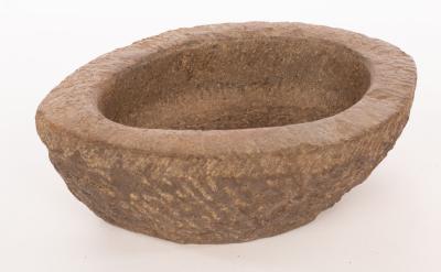 Appraisal: A th Century Indian oval granite opium mortar cm x