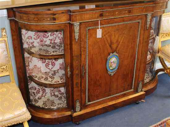 Appraisal: A Victorian inlaid walnut credenza with sevres style porcelain mount