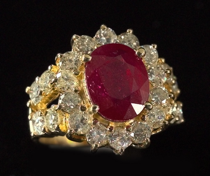 Appraisal: Fourteen-Karat Yellow Gold Ruby and Diamond Dinner Ring featuring a