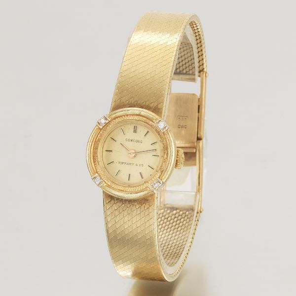 Appraisal: CONCORD K LADIES WRISTWATCH long Brushed gold dial with gold