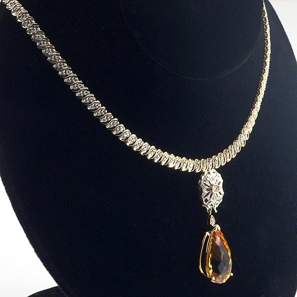 Appraisal: DIAMOND CITRINE NECKLACE k wg and yg Diamond ribbon suspends