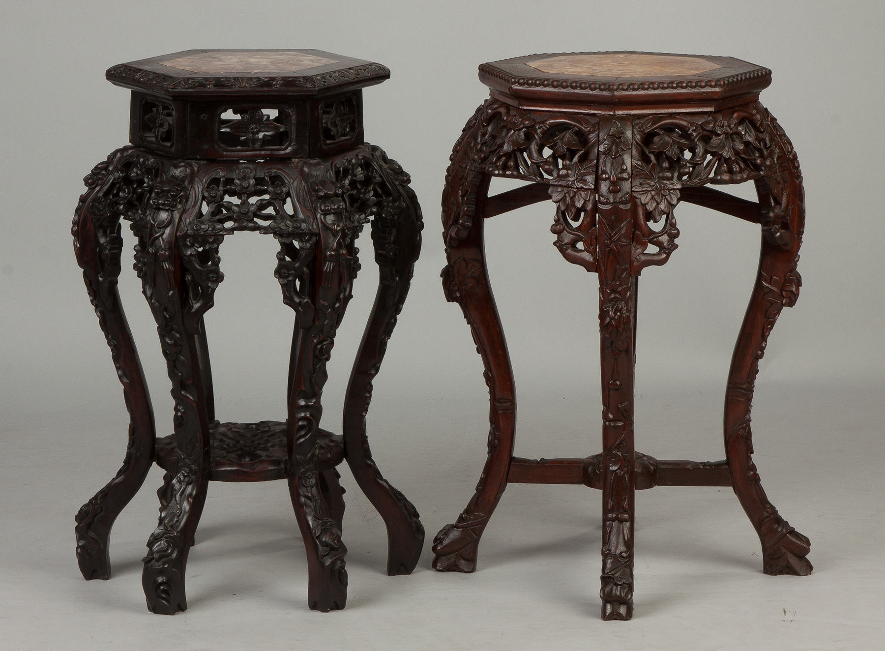 Appraisal: Two Similar Chinese Carved Hardwood Stands with Soapstone Top Late