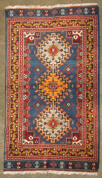 Appraisal: An Afghan rug size approximately ft in x ft in