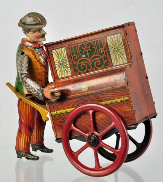 Appraisal: Tin Litho Pete the Organ Grinder Wind-Up Toy German Probably