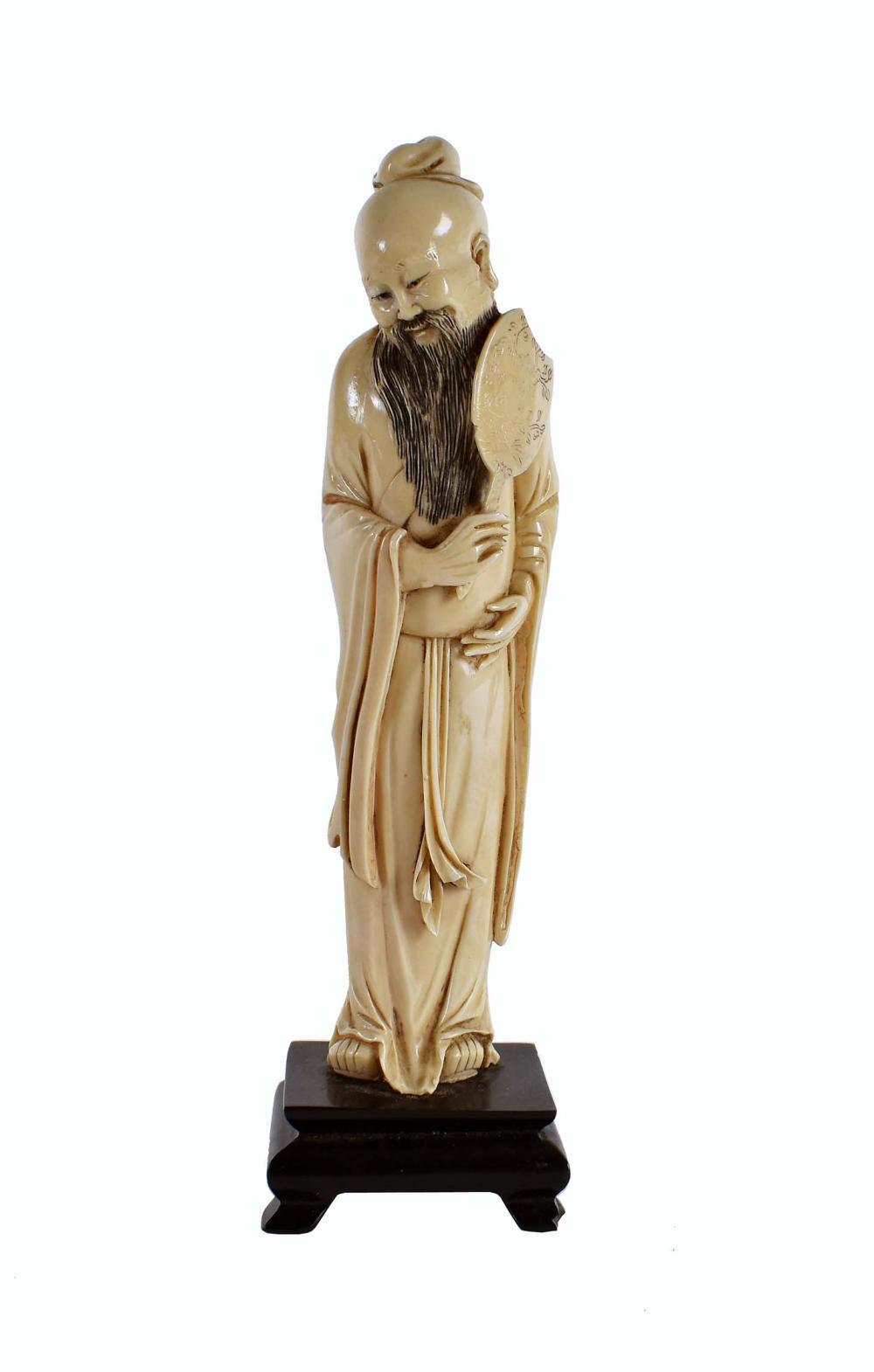 Appraisal: CHINESE CARVED FIGURE OF AN ELDERLY GENTLEMANEarly th Century The