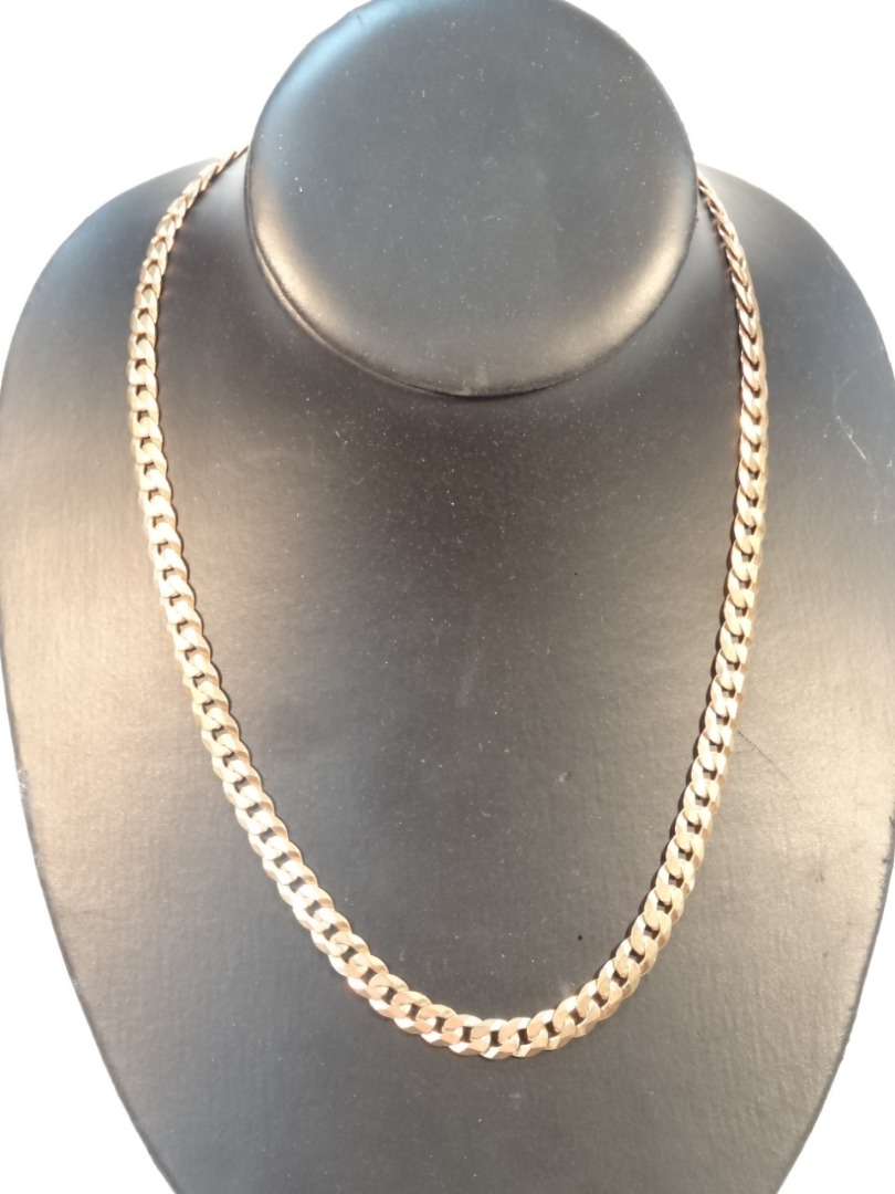 Appraisal: A heavy curb link necklace with lever catch marked cm