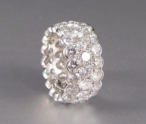 Appraisal: SPARKLING PLATINUM CT DIAMOND BAND round brilliant cut diamonds in