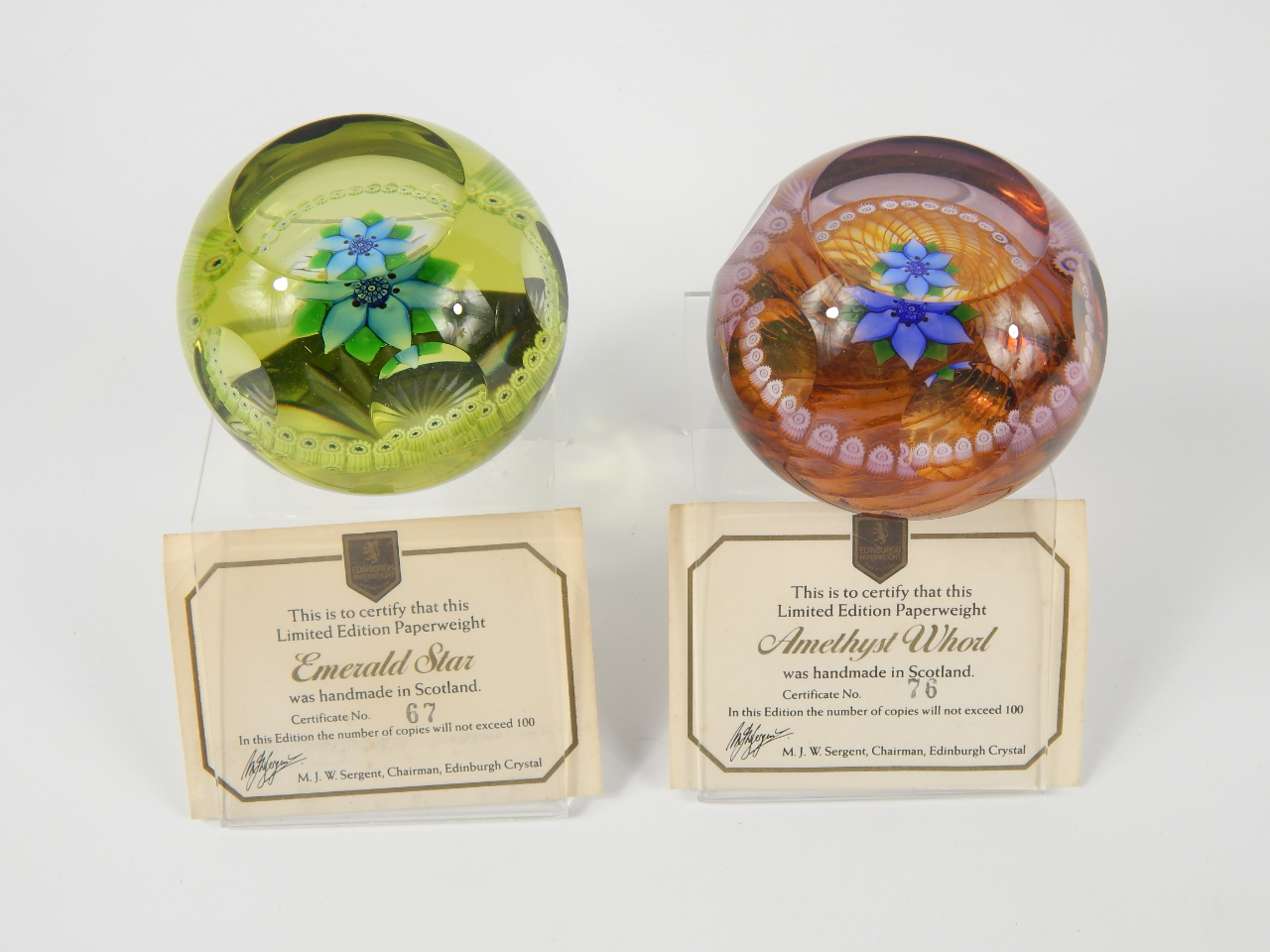 Appraisal: An Edinburgh Crystal paperweight Amethyst Whorl limited edition and another