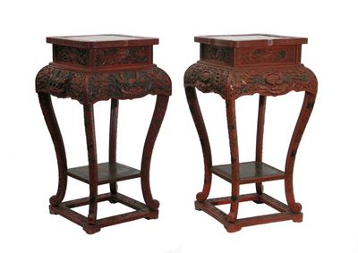 Appraisal: Two square red lacquer stands deeply carved with grotesque masks