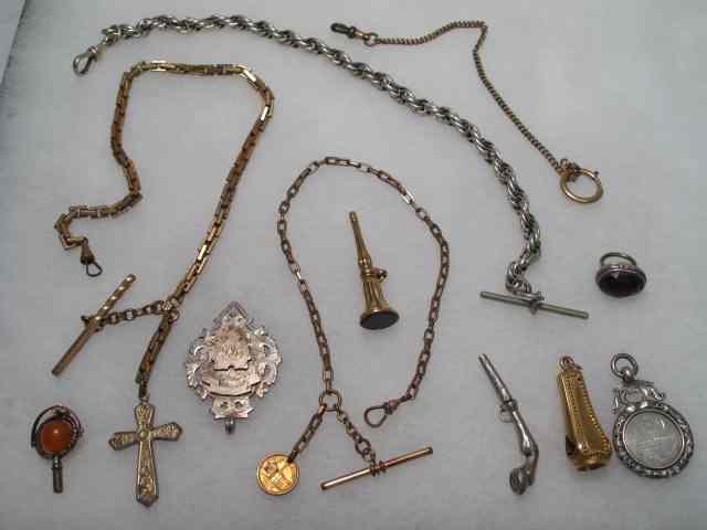 Appraisal: Assorted watch chains key fobs Includes four watch chains sterling