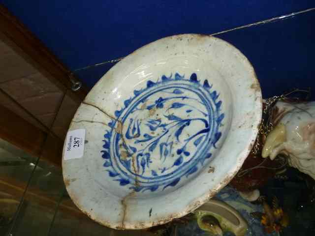 Appraisal: AN ANTIQUE TIN GLAZED BLUE AND WHITE SHALLOW DISH diameter