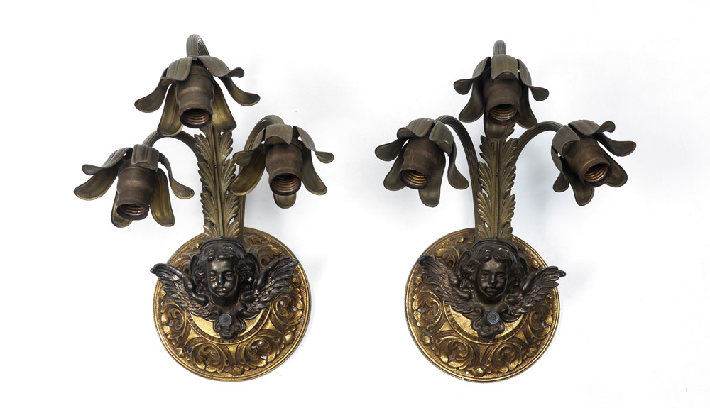 Appraisal: PAIR ANGEL FIGURAL WALL SCONCE LAMPS light wall sconces with