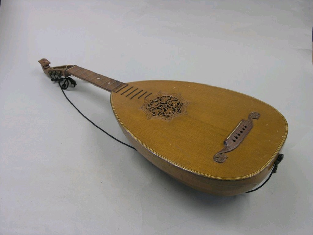 Appraisal: A lute with carved and pierced detail unstrung