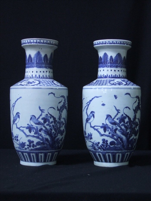 Appraisal: PAIR CHINESE BLUE WHITE BALUSTER VASES Decorated with birds and