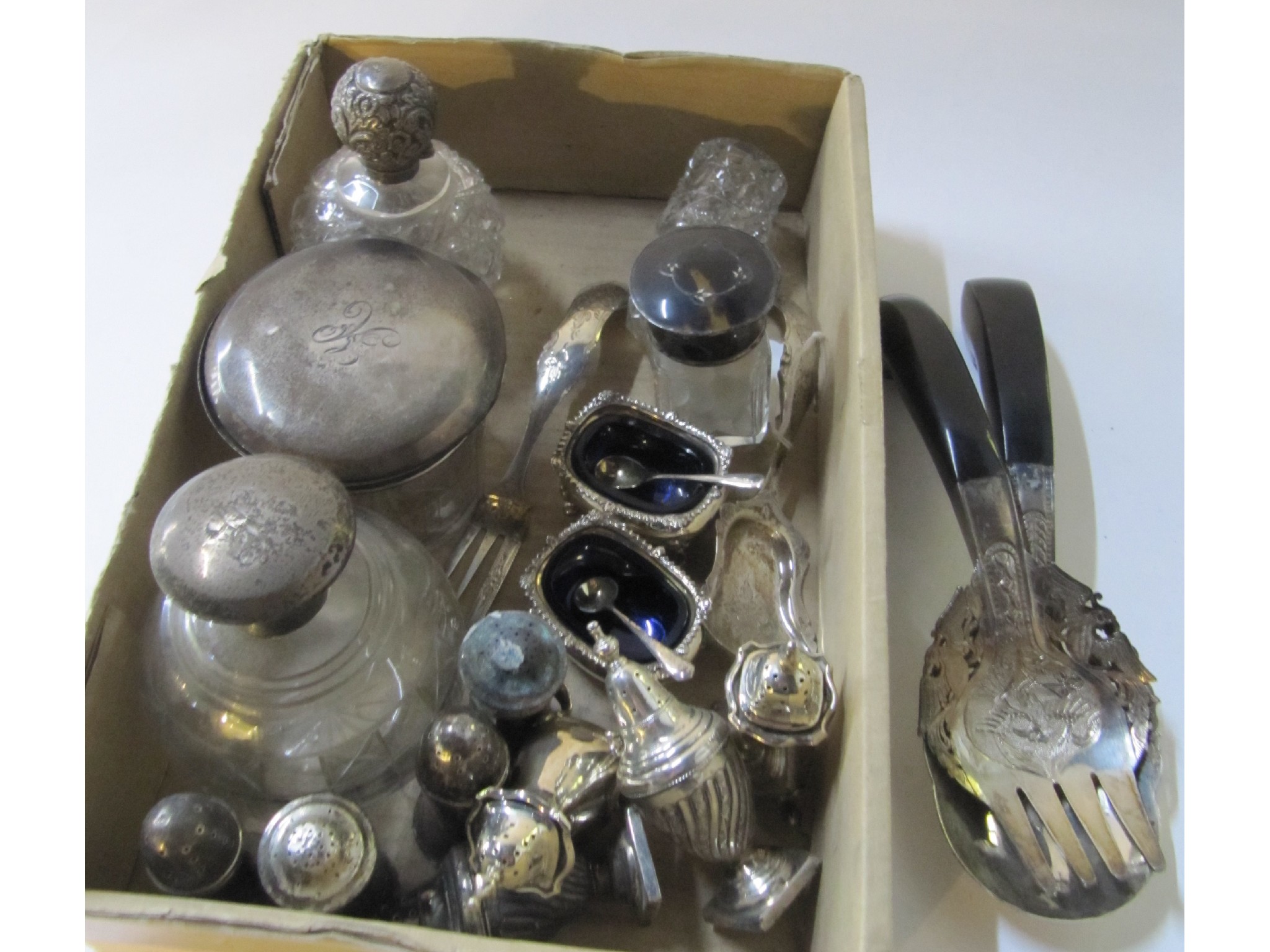 Appraisal: A lot comprising silver topped scent bottles jars silver condiments