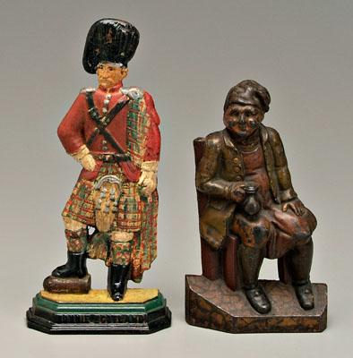 Appraisal: Two Scottish cast iron doorstops seated Tam-o -shanter holding mug