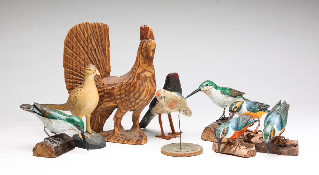 Appraisal: AMERICAN FOLK ART WOOD CARVED BIRDS Twentieth century Including eight