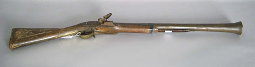 Appraisal: Two double barrel shotguns th c together with a blunderbuss