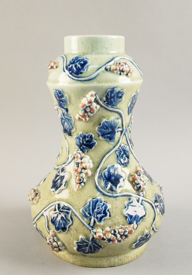 Appraisal: Chinese Celadon Gourd-form Vase having relief decoration of blue and