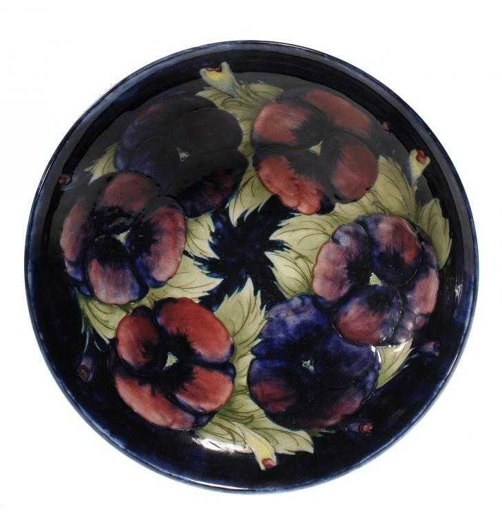 Appraisal: A MOORCROFT PANSY DISH DESIGNED BY WILLIAM MOORCROFT cm diam