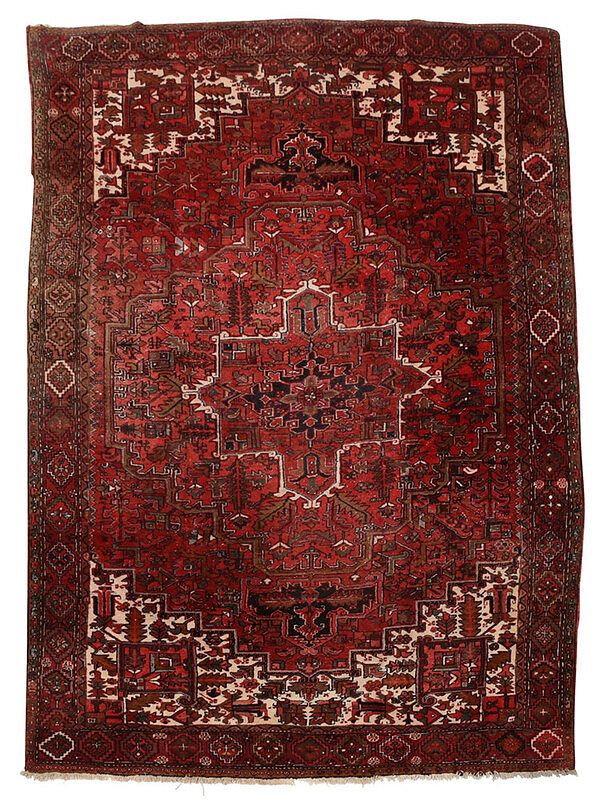 Appraisal: Heriz Carpet Persian th century red field geometric leaf and