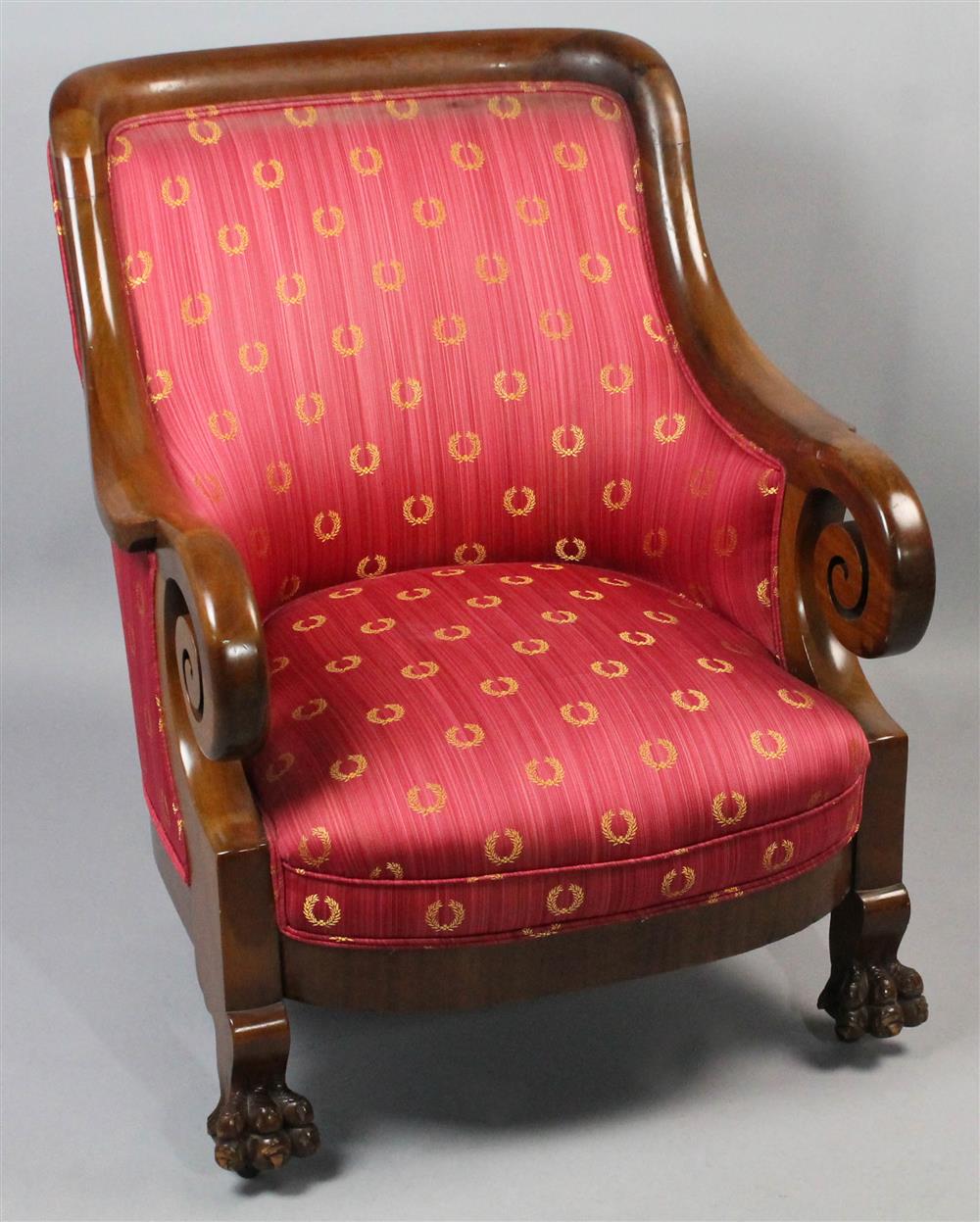 Appraisal: EMPIRE STYLE MAHOGANY ARM CHAIR having an exposed frame with