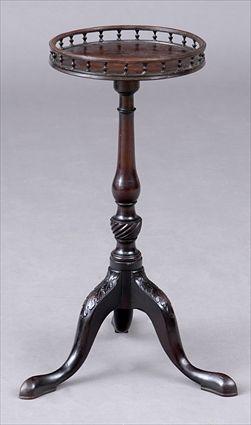 Appraisal: GEORGE III MAHOGANY CANDLESTAND The top with spindle gallery above