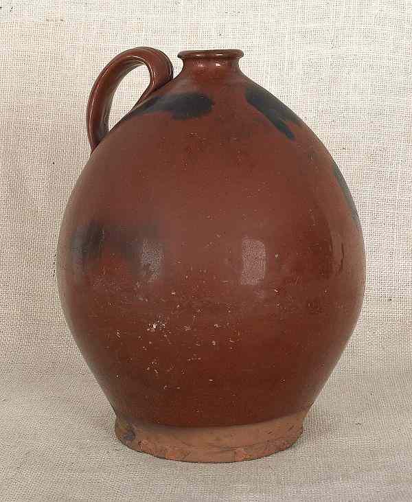 Appraisal: Pennsylvania redware jug th c with manganese splash decoration h