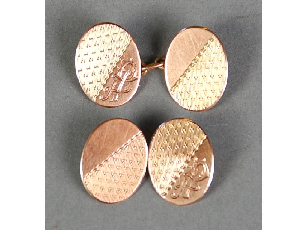 Appraisal: PAIR OF ct GOLD ENGINE TURNED DOUBLE OVAL CUFF LINKS