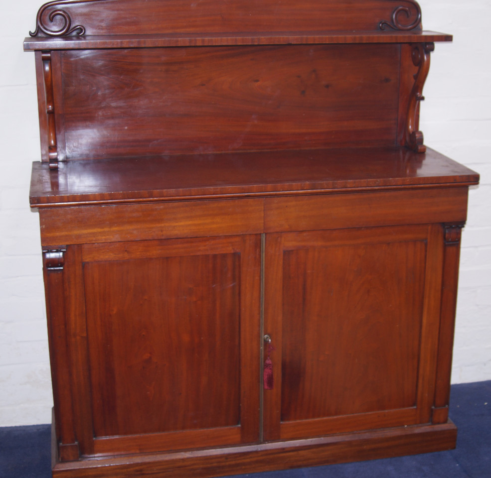 Appraisal: A William IV mahogany chiffonier the single shelf back raised