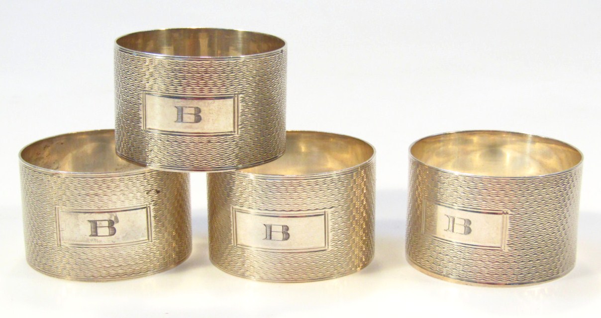 Appraisal: A set of four George VI silver napkin rings of