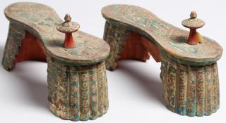 Appraisal: Pair of Elaborate Carved Painted Pattens With floral and geometric