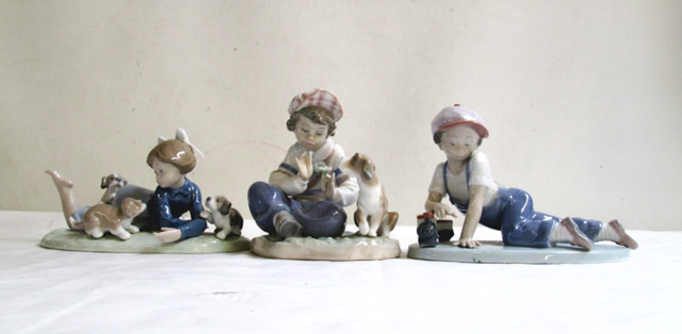 Appraisal: THREE LLADRO PORCELAIN FIGURINES I Hope She Does sculptor Regino