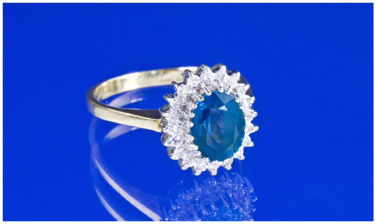 Appraisal: ct Gold Cluster Ring Central Blue Coloured Central Stone Surrounded