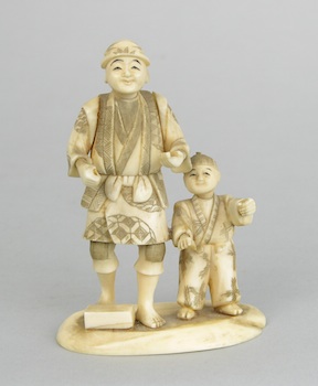 Appraisal: An Ivory Carving of a Man and Boy Chinese Ivory