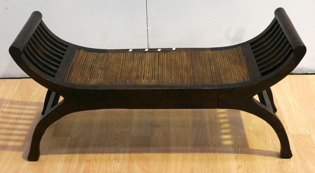 Appraisal: A stained pine curule form bench