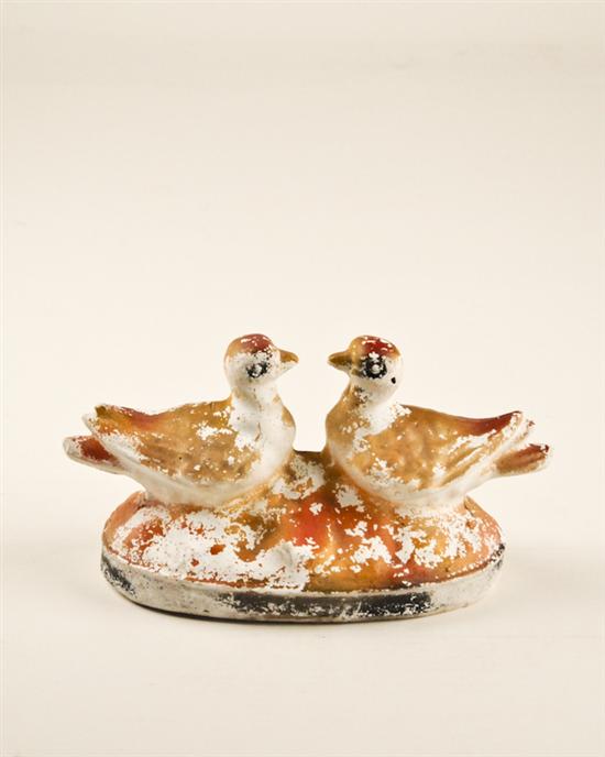 Appraisal: L th C Chalkware Lovebirds with remnants of paint high