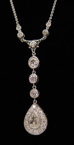 Appraisal: THE ULTIMATE PLATINUM CT DIAMOND Y NECKLACE The pear drop