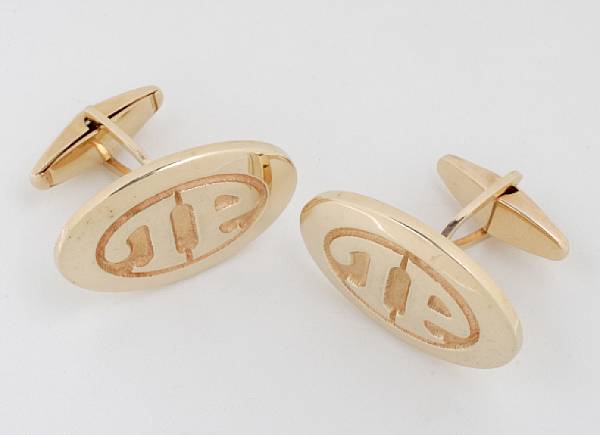 Appraisal: A Tyrone Power set of k gold monogrammed cufflinks s