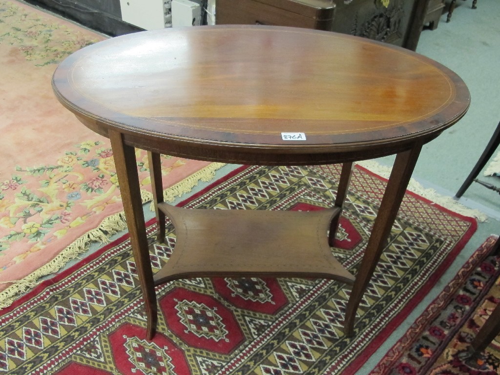 Appraisal: Edwardian mahogany inlaid oval two tier occasional table