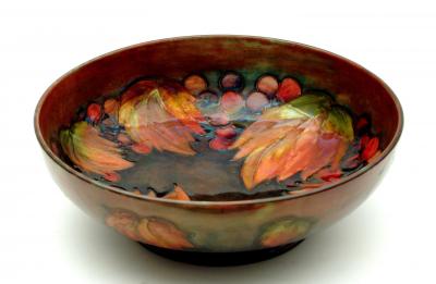 Appraisal: A MOORCROFT POTTERY FLAMBE BOWL of shallow circular form tube