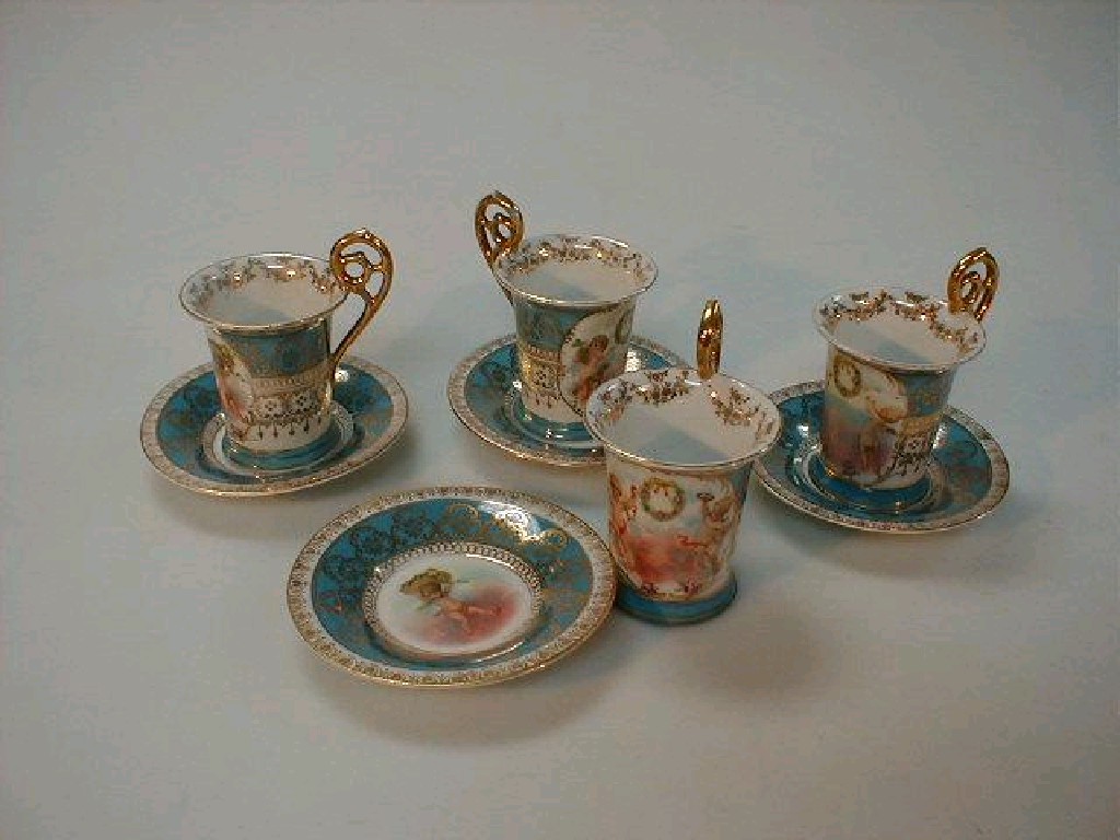 Appraisal: A set of four Continental porcelain trembleuse cups and saucers