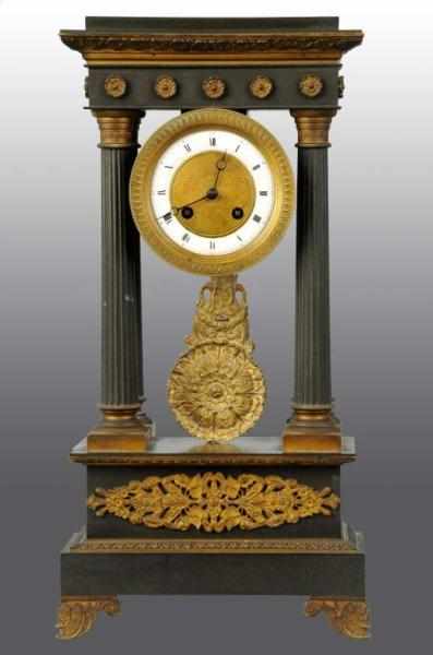 Appraisal: Metal Open Pillar Time Strike Clock Description Has pendulum and