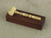 Appraisal: MINIATURE WHALEBONE MALLET - American mid th C the mallet