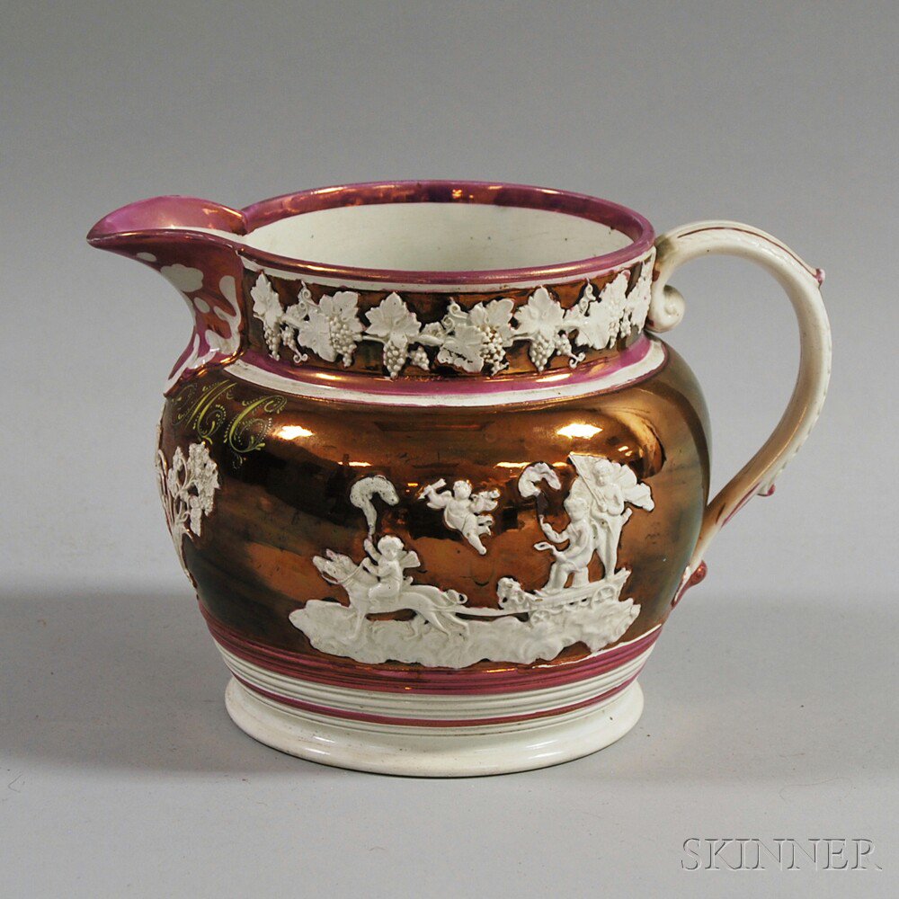 Appraisal: Copper and Pink Lustre Pitcher th century the copper band