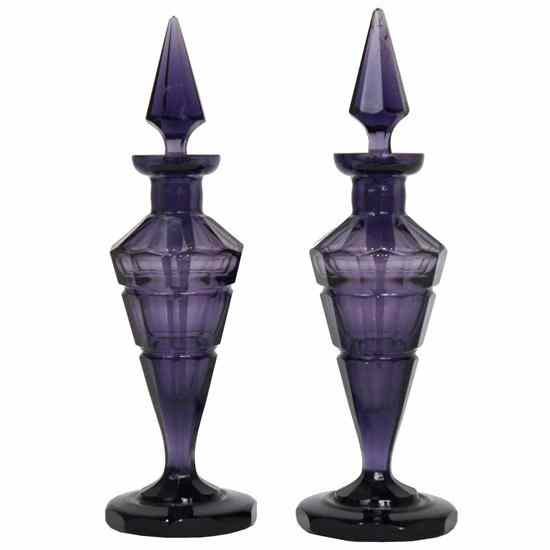 Appraisal: A Pair of Bohemian Amethyst Faceted Glass Perfume Bottles circa